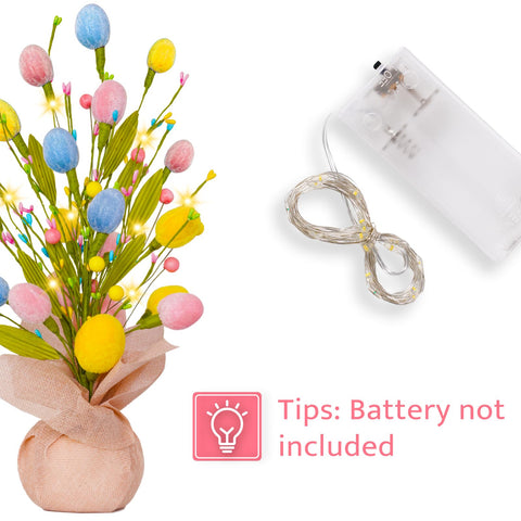 XmasExp LED lights illuminating Easter eggs with a cozy indoor glow