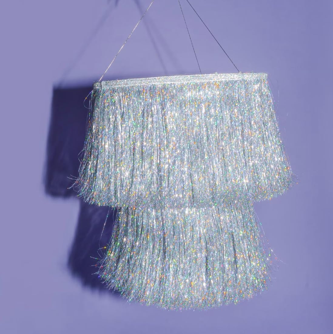 xo Fetti fringe chandelier iridescent silver foil adds sparkling ambiance to parties