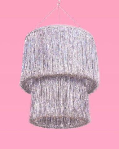 xo Fetti fringe chandelier New Year's Eve decor creates festive reflections