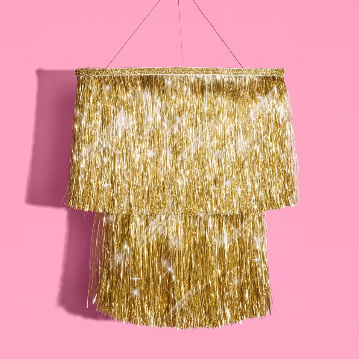 xo Fetti gold fringe chandelier with shimmering foil fringe for a festive ambiance