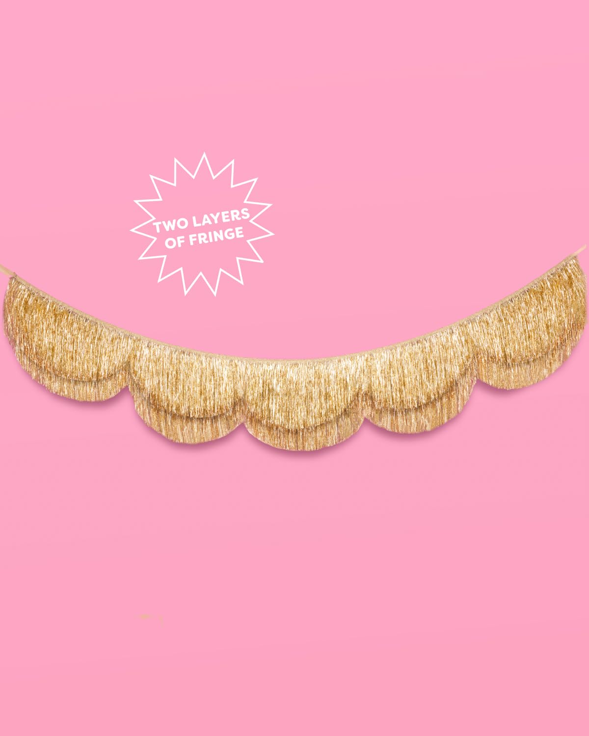 Close-up of luxe gold foil fringe on the xo, Fetti banner