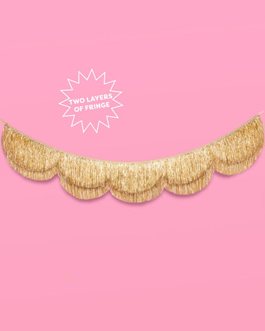 Close-up of luxe gold foil fringe on the xo, Fetti banner
