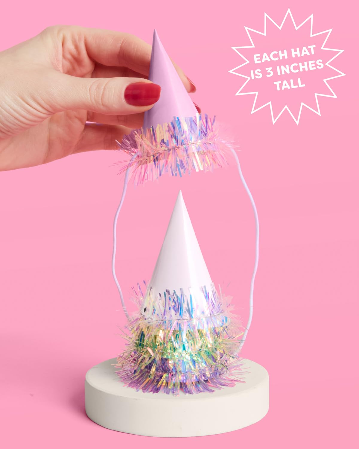 xo Fetti pink hat with iridescent fringe closeup highlighting colorful sparkle.