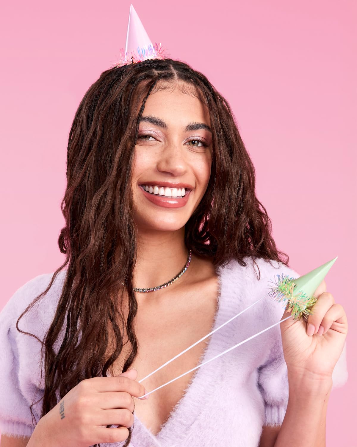 xo Fetti white hat fringe closeup for versatile party styling.