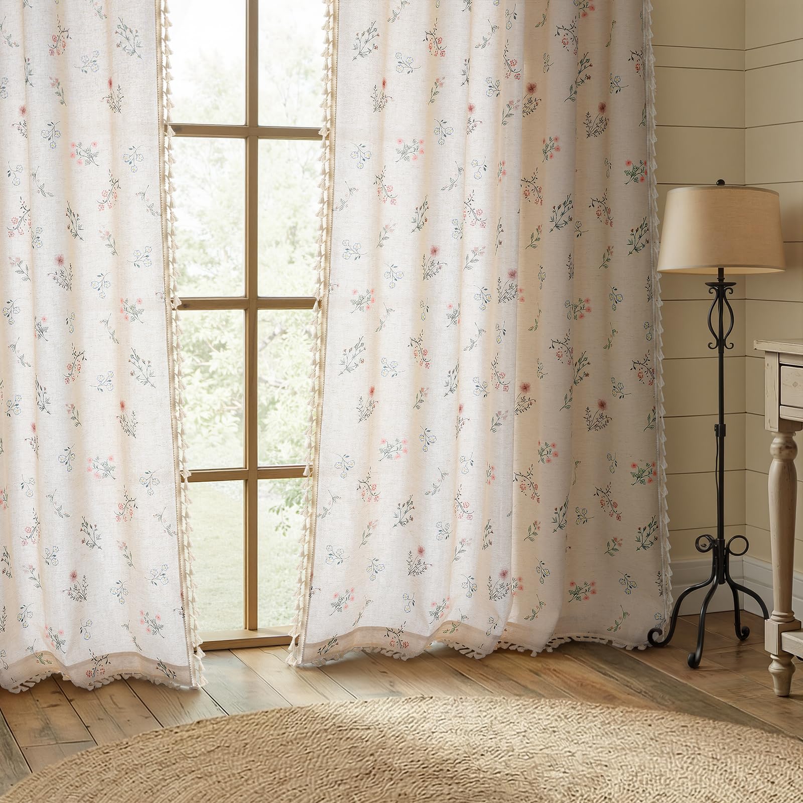 XOGUIBO tassel-detail beige curtain adds vintage charm to any bedroom.