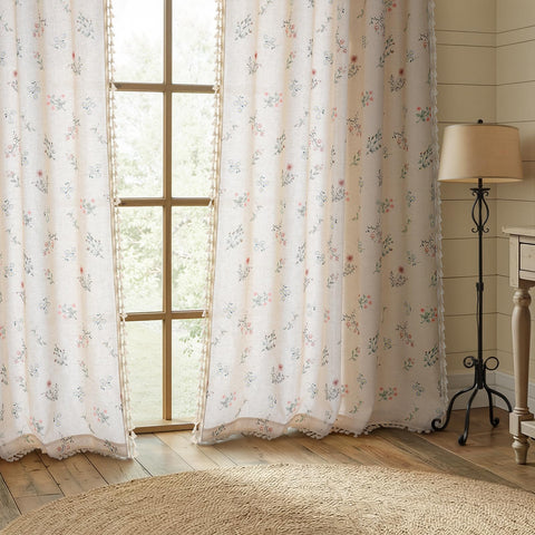 XOGUIBO tassel-detail beige curtain adds vintage charm to any bedroom.