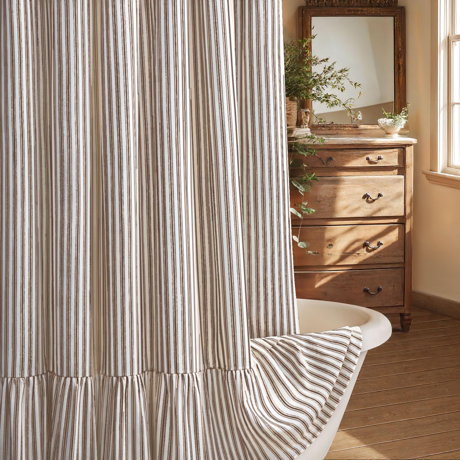 XOGUIBO farmhouse shower curtain with ruffle hem adds soft, elegant detail to the bathroom.