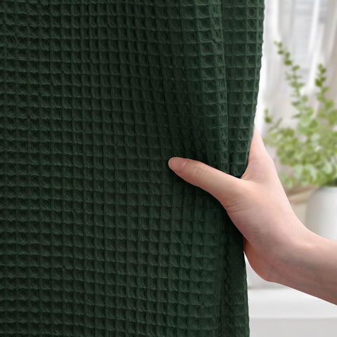 Heavyweight fabric drape of XOGUIBO curtain provides privacy.