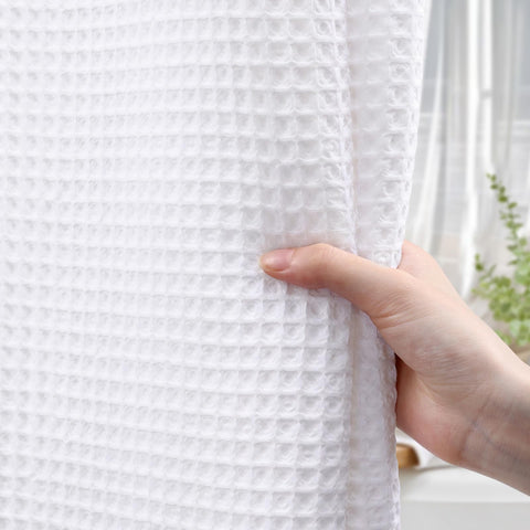 XOGUIBO white curtain finish resembles cotton with easy care for busy homes.