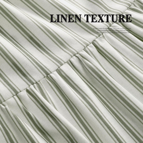 XOGUIBO white-green stripe pattern complements wood and greenery nicely.