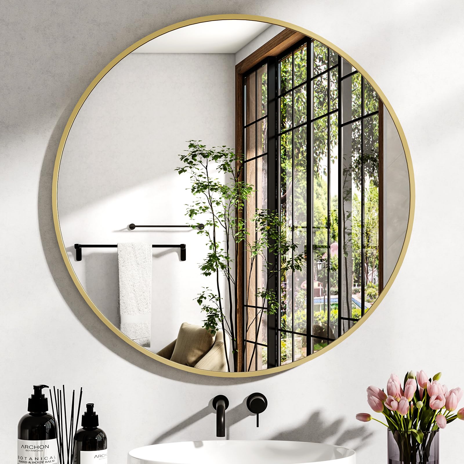 XRAMFY round bathroom mirror over sink reflects light and enlarges space.