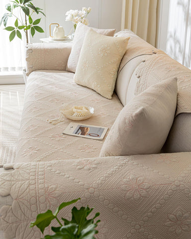 XSlive cover in living room setting demonstrates versatile protection from pets and spills