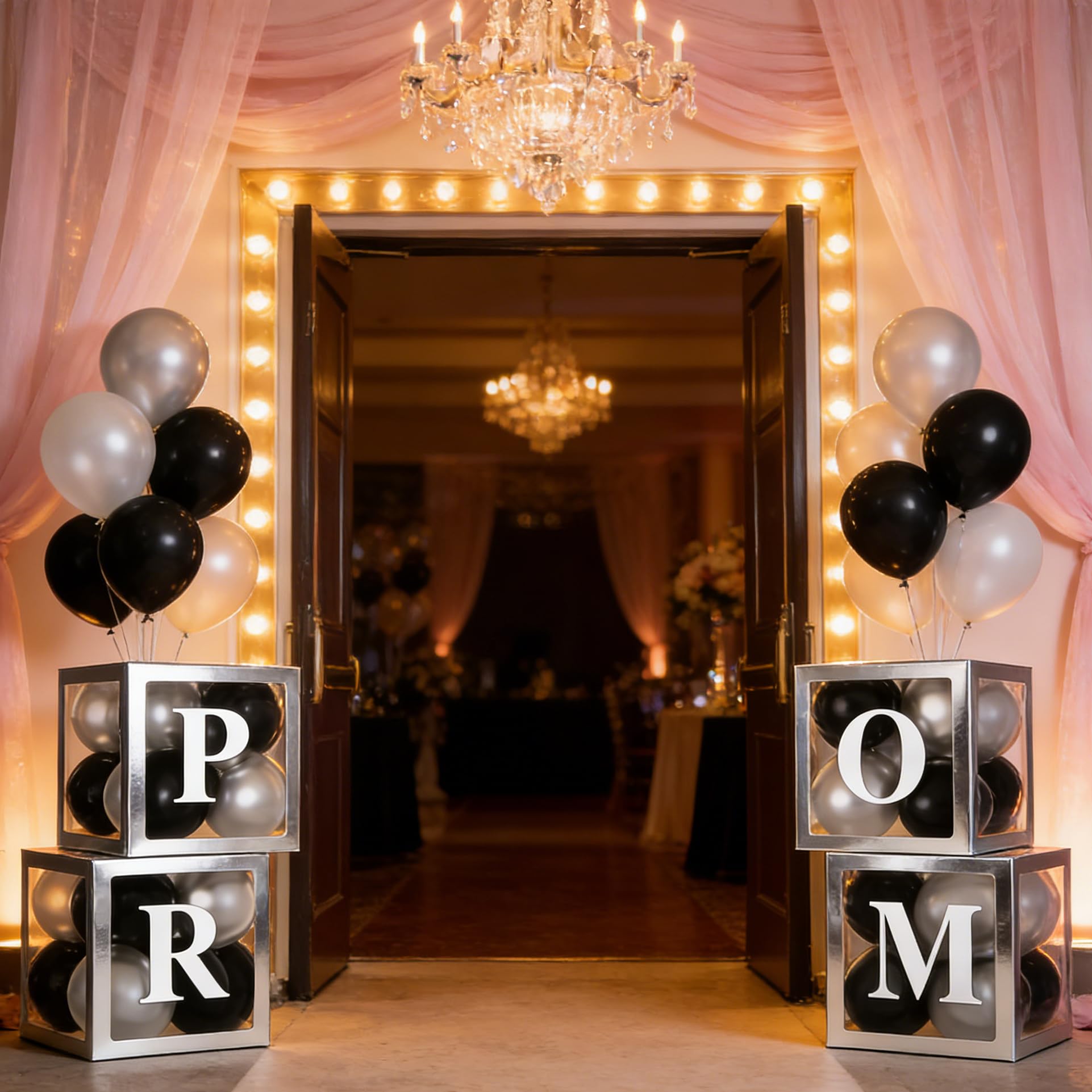 Xvvti transparent balloon boxes showcase PROM letters above the cake table.