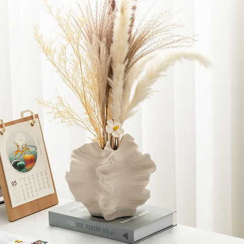 XYQXYQ Modern Art Ceramic Vase in white, living room shelf pairing idea.