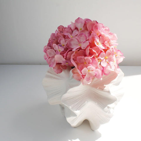 XYQXYQ Modern Art Ceramic Vase in white, side view ideal for shelf styling.