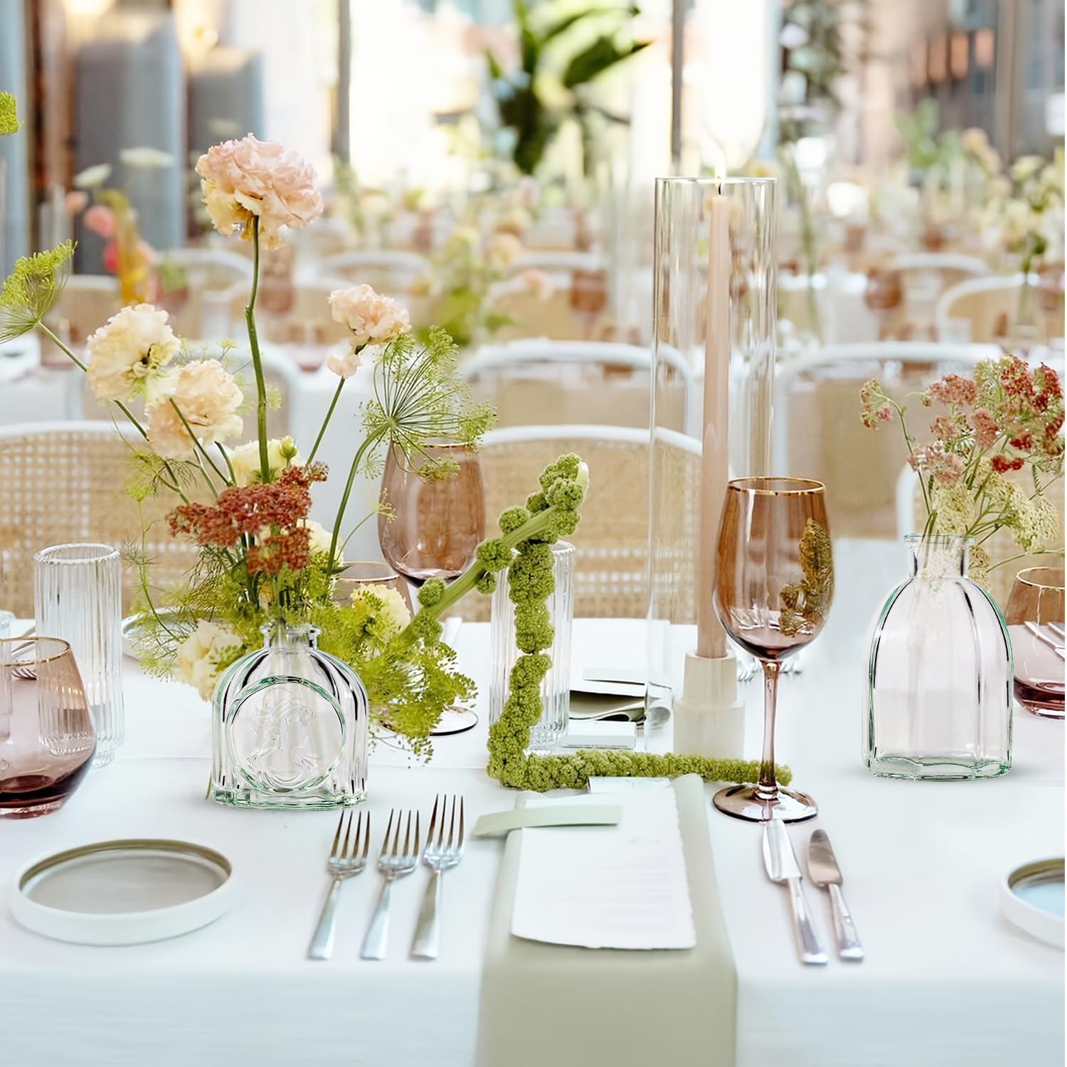 Yabool embossed-pattern clear vases showcase textures and style for any arrangement.