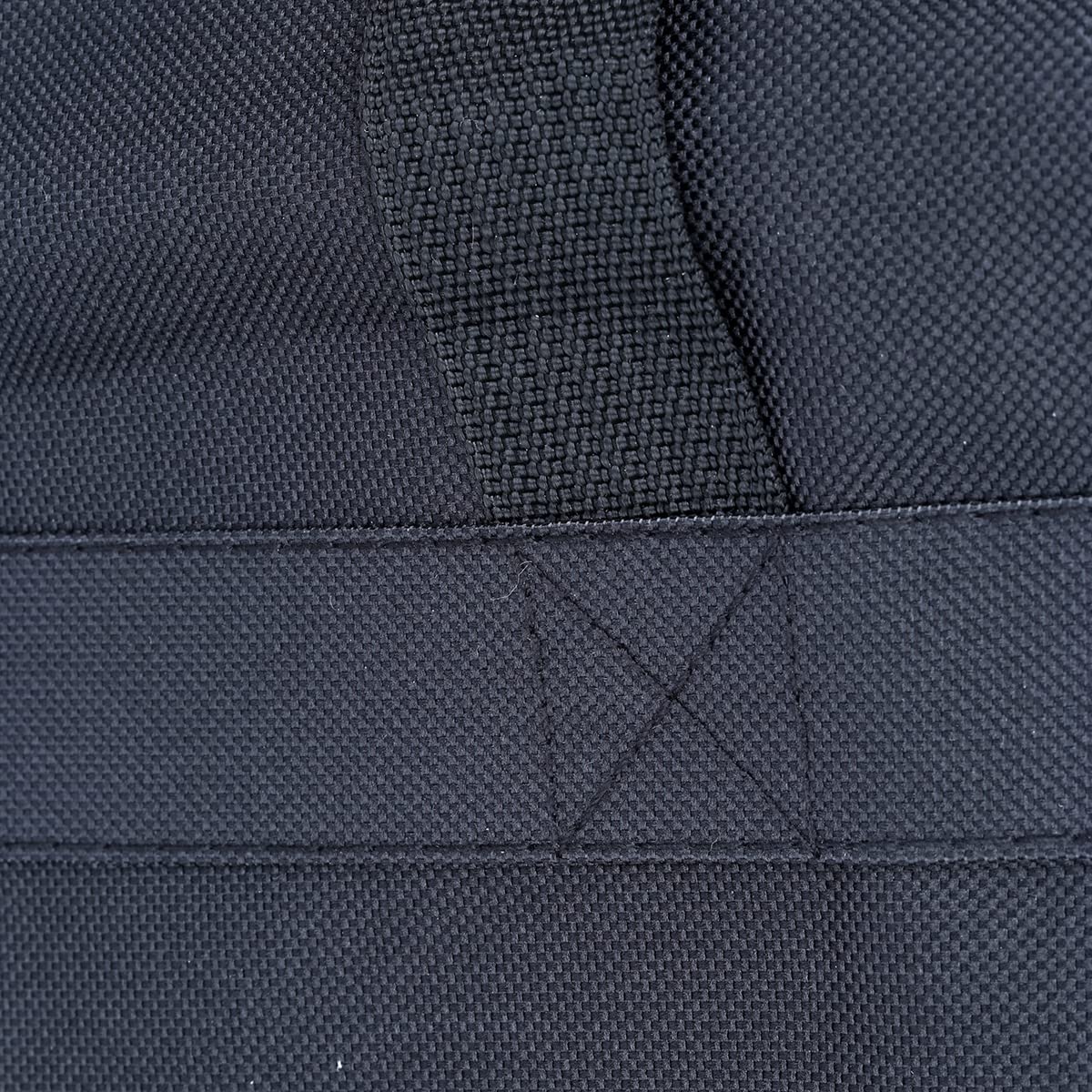 YACQ water-resistant canvas bag with interior coating protects bedding and gear.