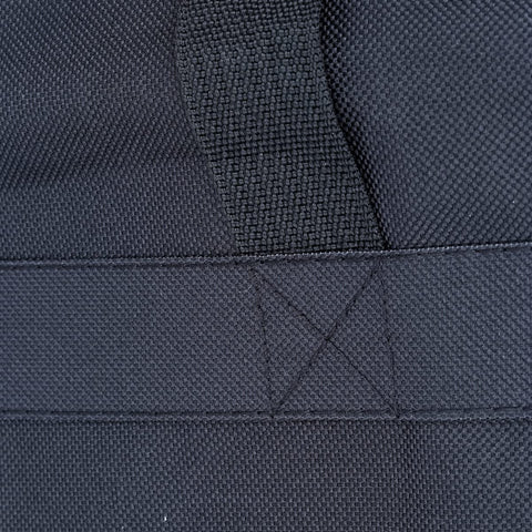 YACQ water-resistant canvas bag with interior coating protects bedding and gear.