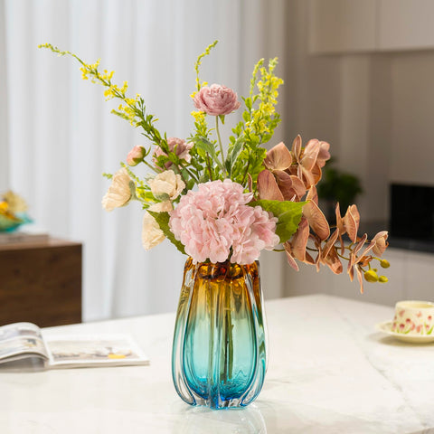 YACSNBF vase on bookshelf, adds colorful texture to displays.