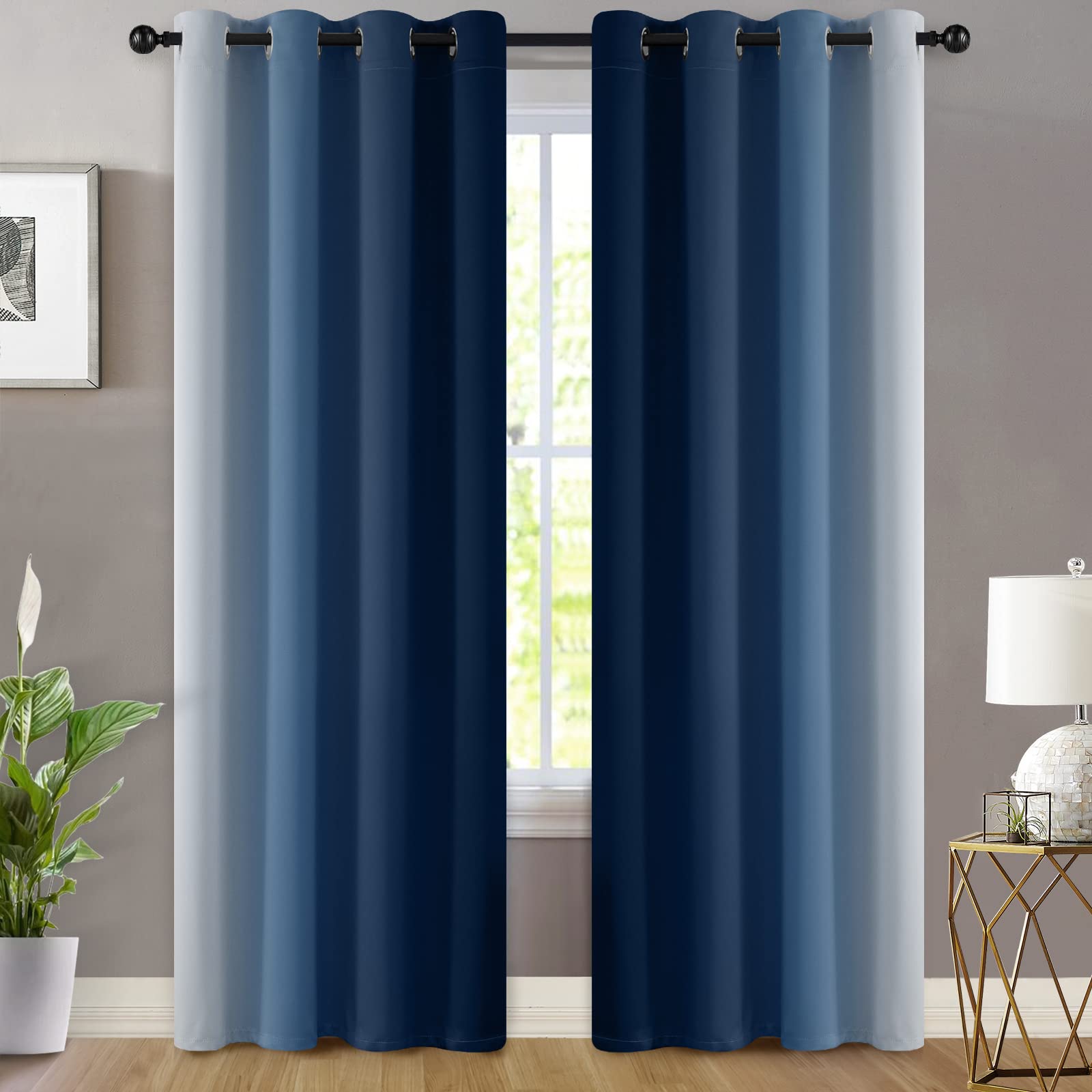 Yakamok gradient curtains with silver grommets add modern style.