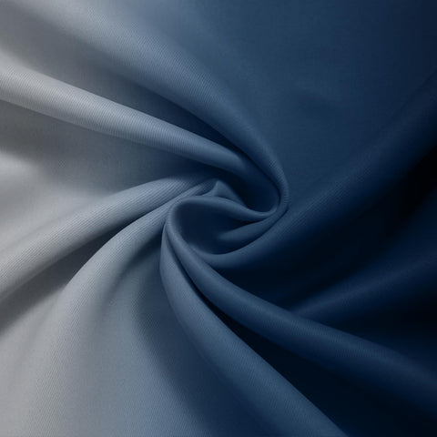 Yakamok ombre curtains in a living room setup with a blue-grey-white gradient.