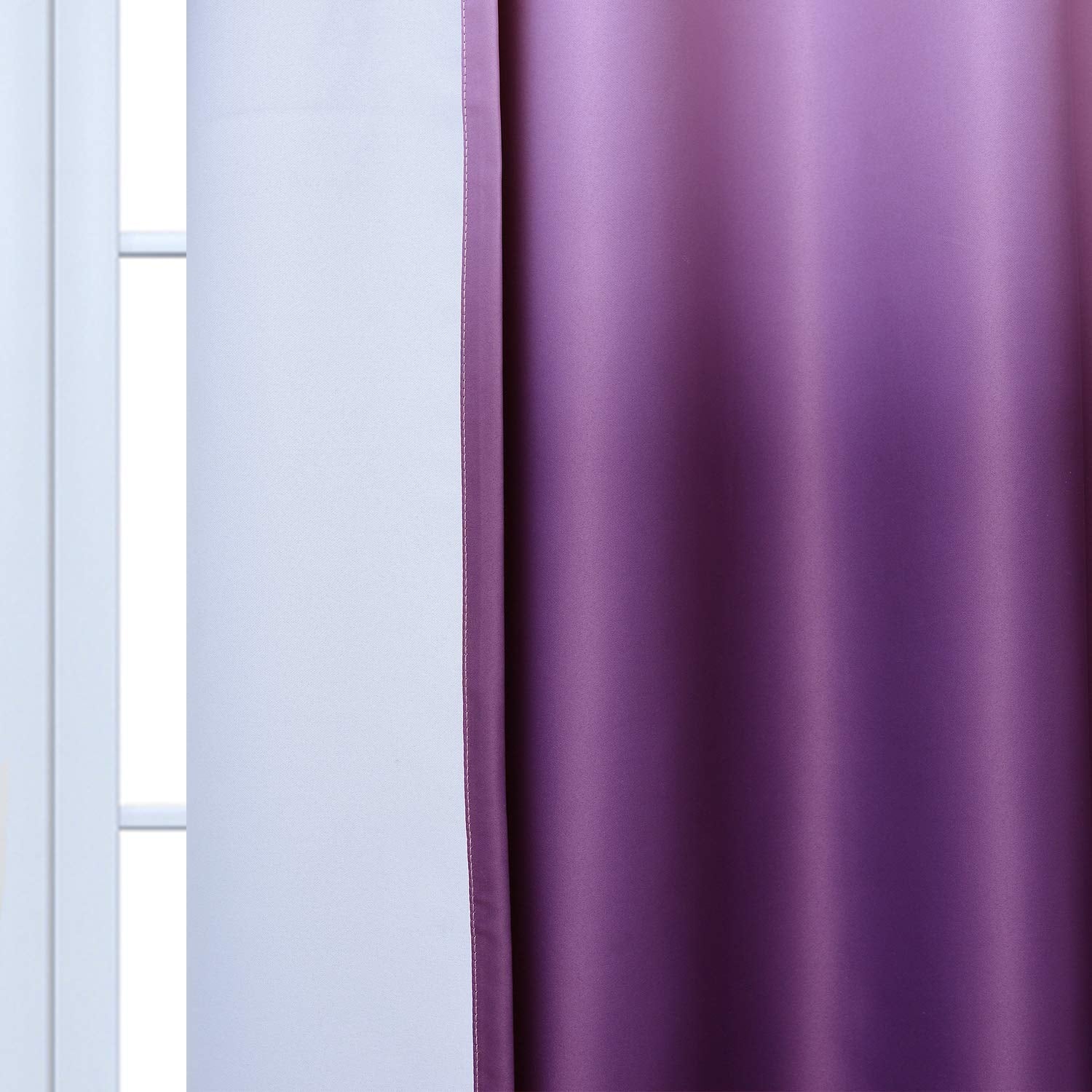 Yakamok grommet-top curtains hang neatly on standard rods for easy installation.