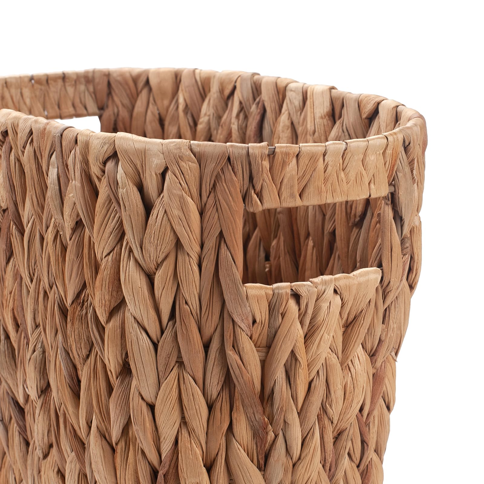 YangqiHome wicker trash sits beside a bed with soft ambient light.