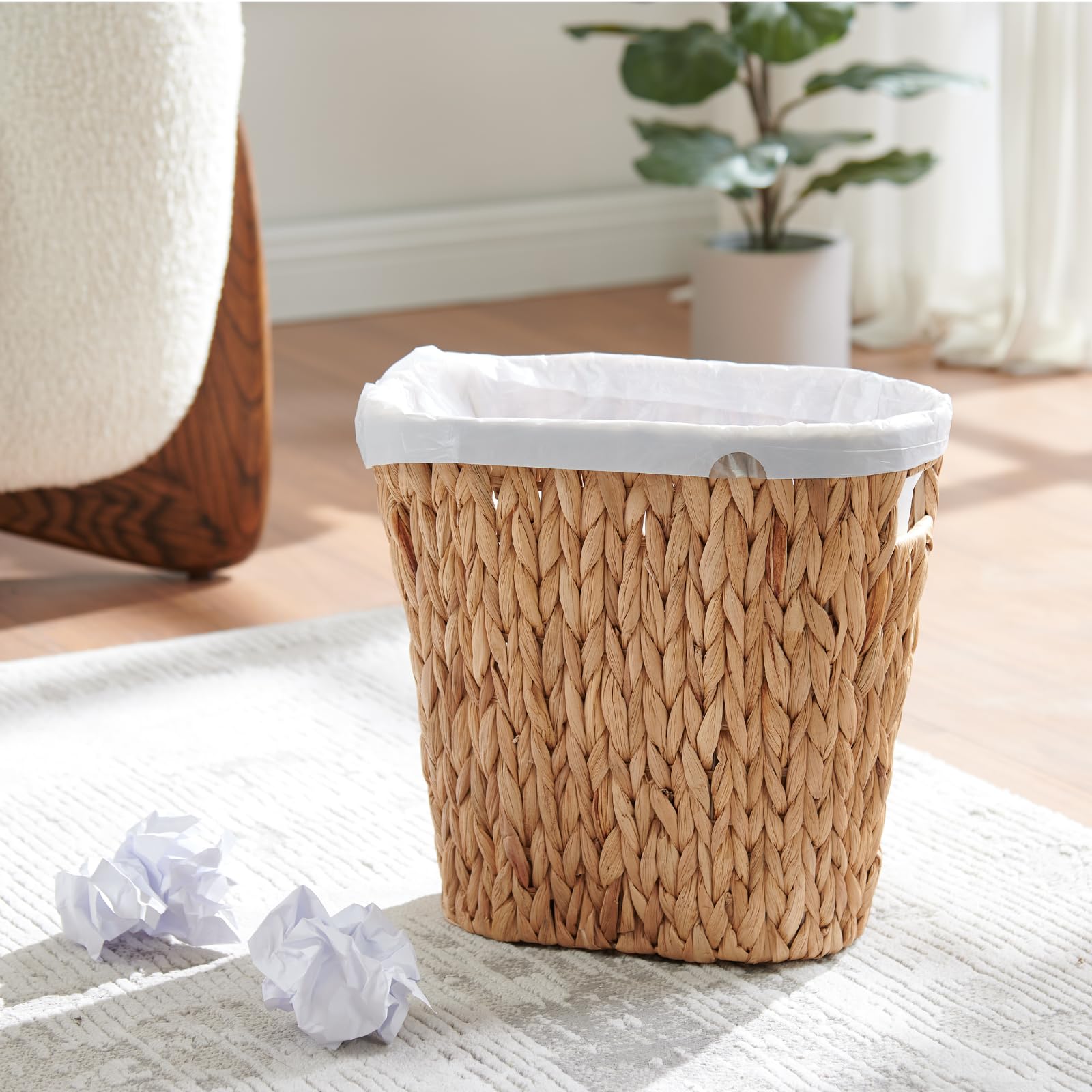 YangqiHome versatile wicker waste basket used as magazine organizer.