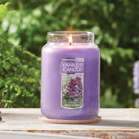 Yankee Candle Lilac Blossoms jar dimensions show generous 22oz capacity for longer fragrance.
