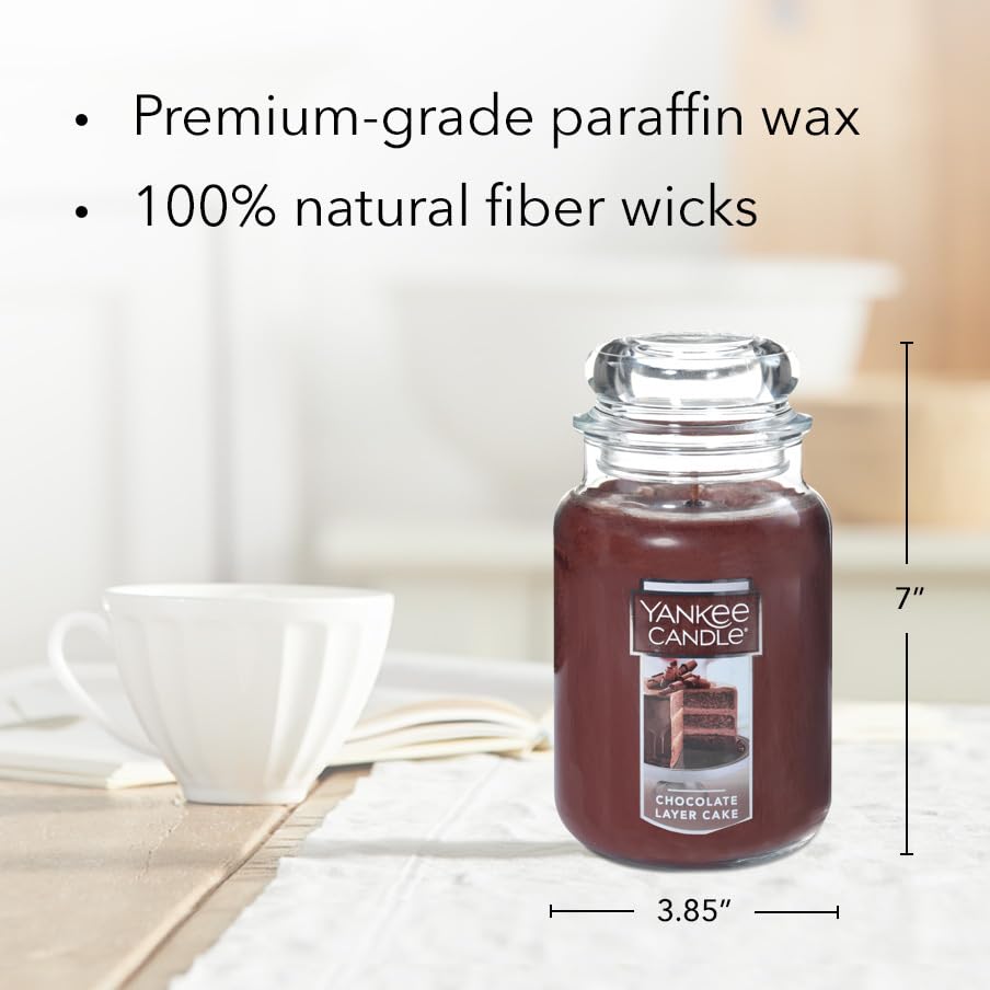 Yankee Candle Chocolate Layer Cake on a coffee table creates inviting ambiance