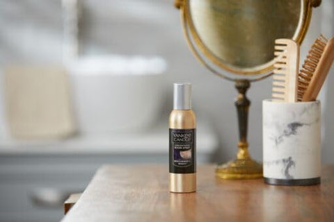 Yankee Candle spray by bathroom fixtures for immediate ambiance refresh