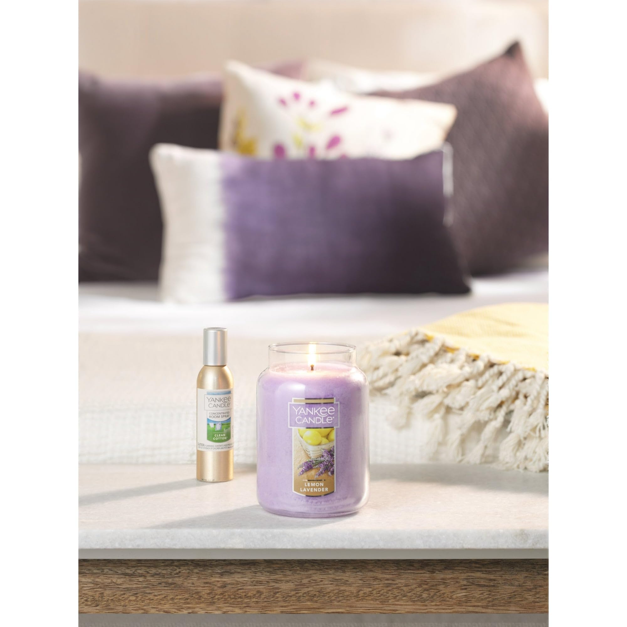 Yankee Candle Concentrated Room Spray 3-pack display signals ongoing freshness.