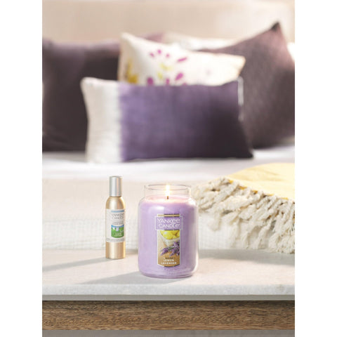 Yankee Candle Concentrated Room Spray 3-pack display signals ongoing freshness.