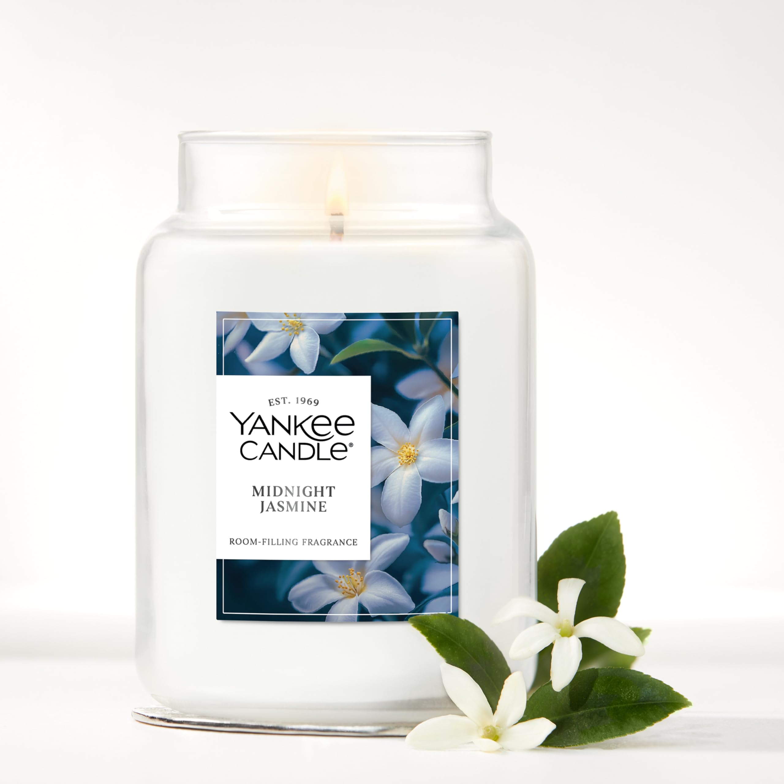Yankee Candle Midnight Jasmine fragrance-diffusion image shows soft, inviting room aroma.