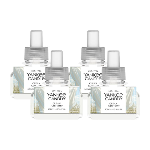 Yankee Candle ScentPlug refill bottle snapped into base for lasting Clean Cotton fragrance.