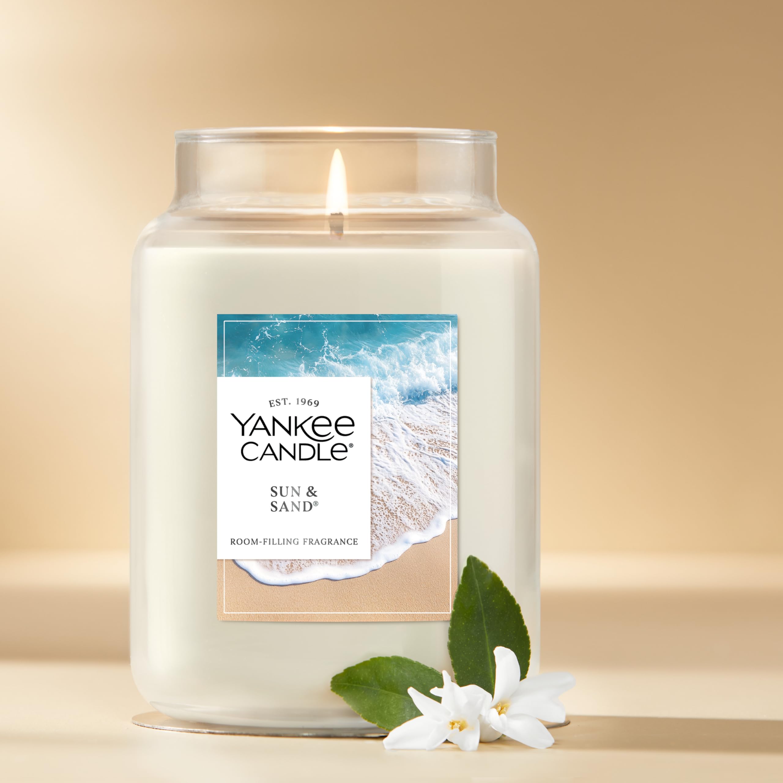 Yankee Candle Sun and Sand burn time focus demonstrates hours of fragrance per jar