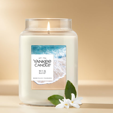 Yankee Candle Sun and Sand burn time focus demonstrates hours of fragrance per jar