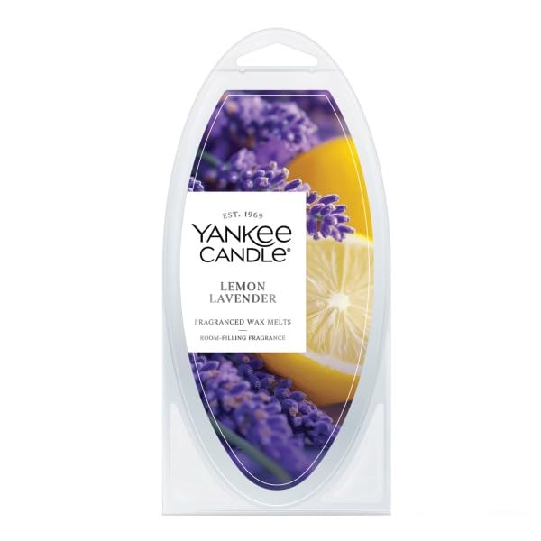Yankee Candle wax warmer setup demonstrates easy, flame-free use.