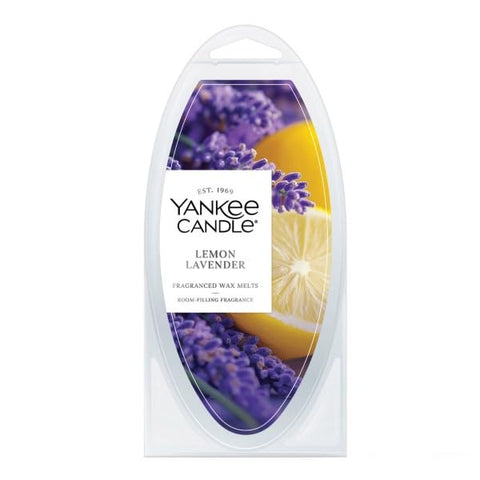 Yankee Candle wax warmer setup demonstrates easy, flame-free use.
