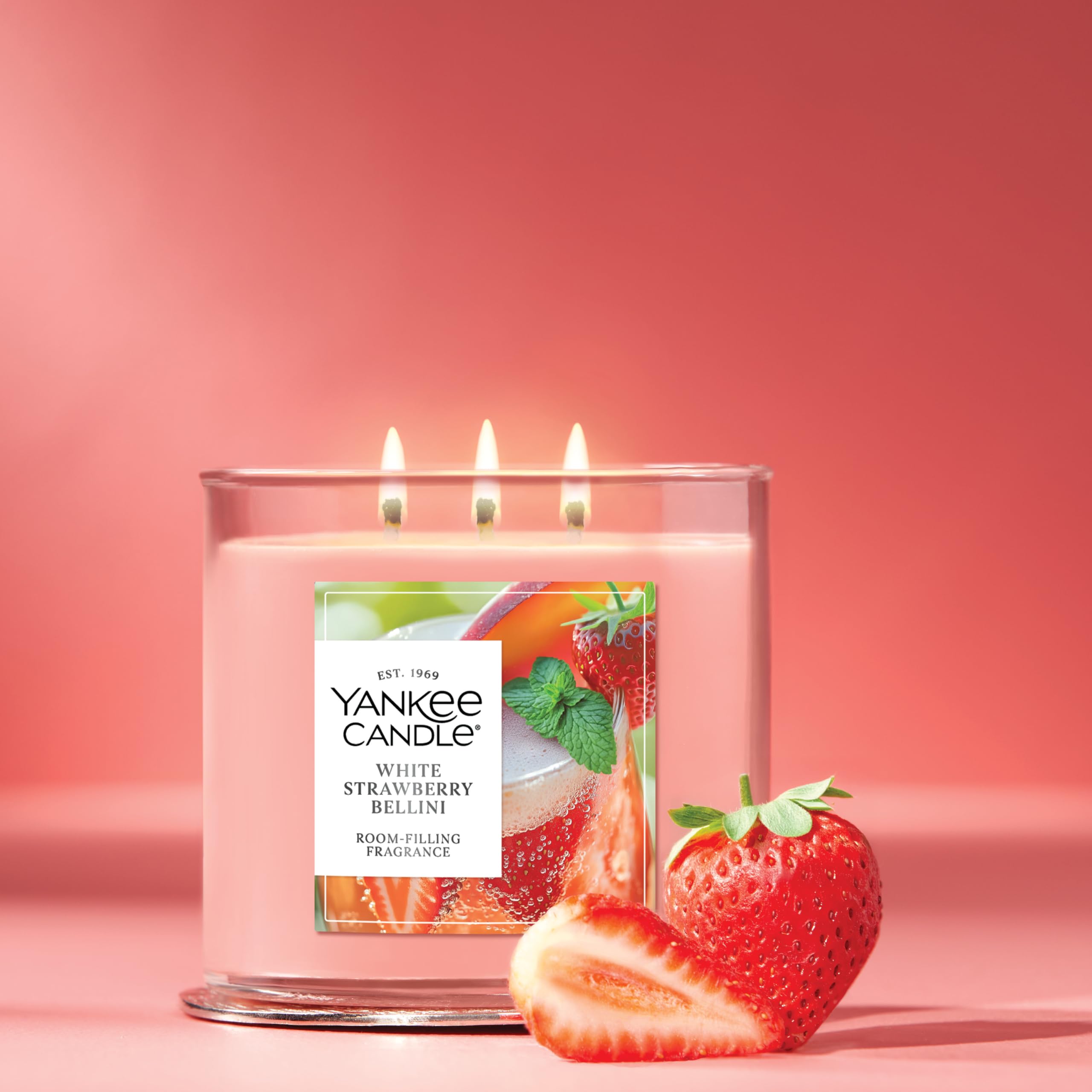 Decorative metal lid on Yankee Candle White Strawberry Bellini protects wax between uses