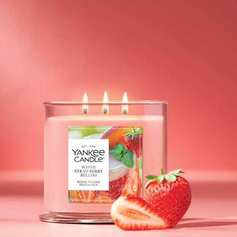 Decorative metal lid on Yankee Candle White Strawberry Bellini protects wax between uses