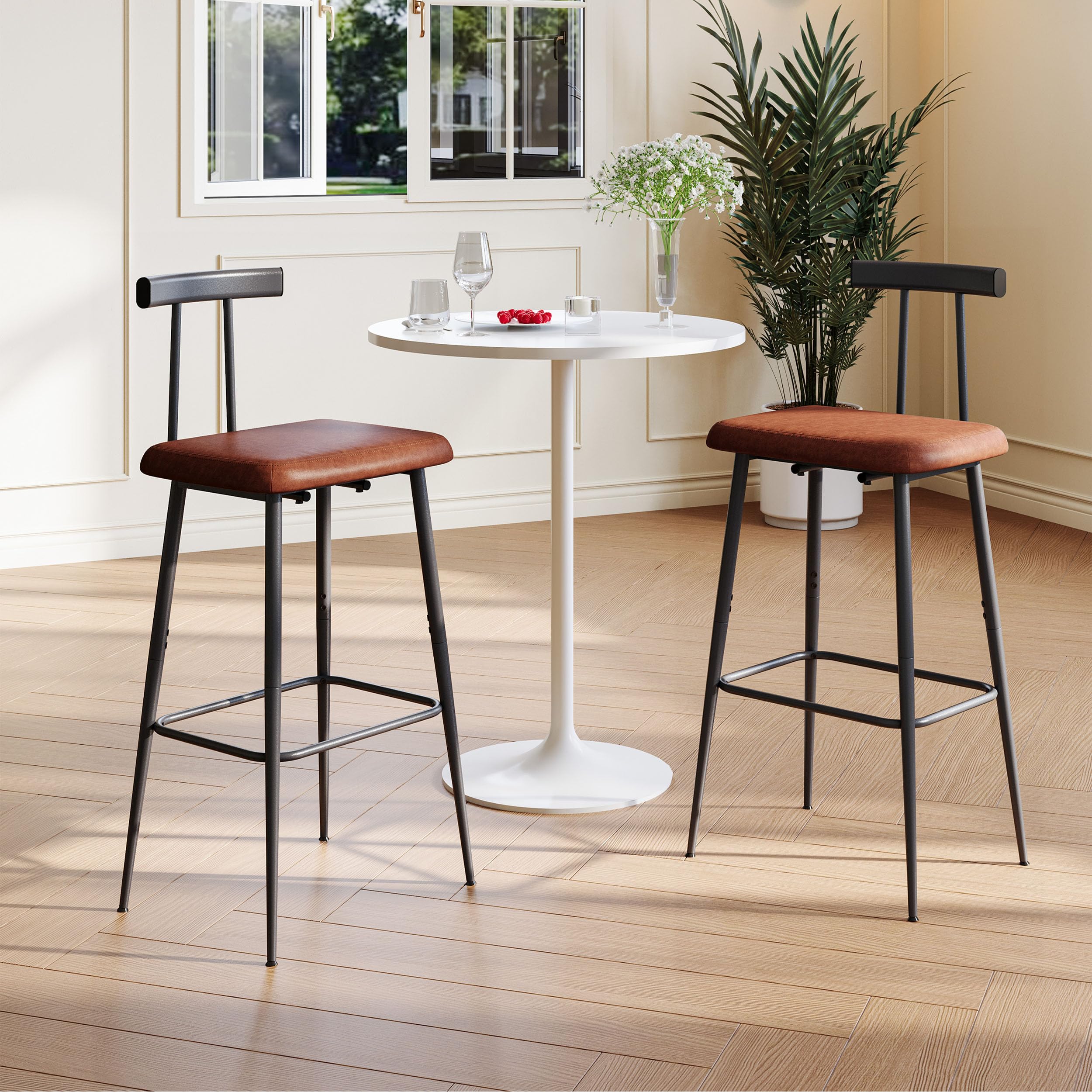 YAUKTAK bar stools with footrest enabling comfortable leg placement during meals.