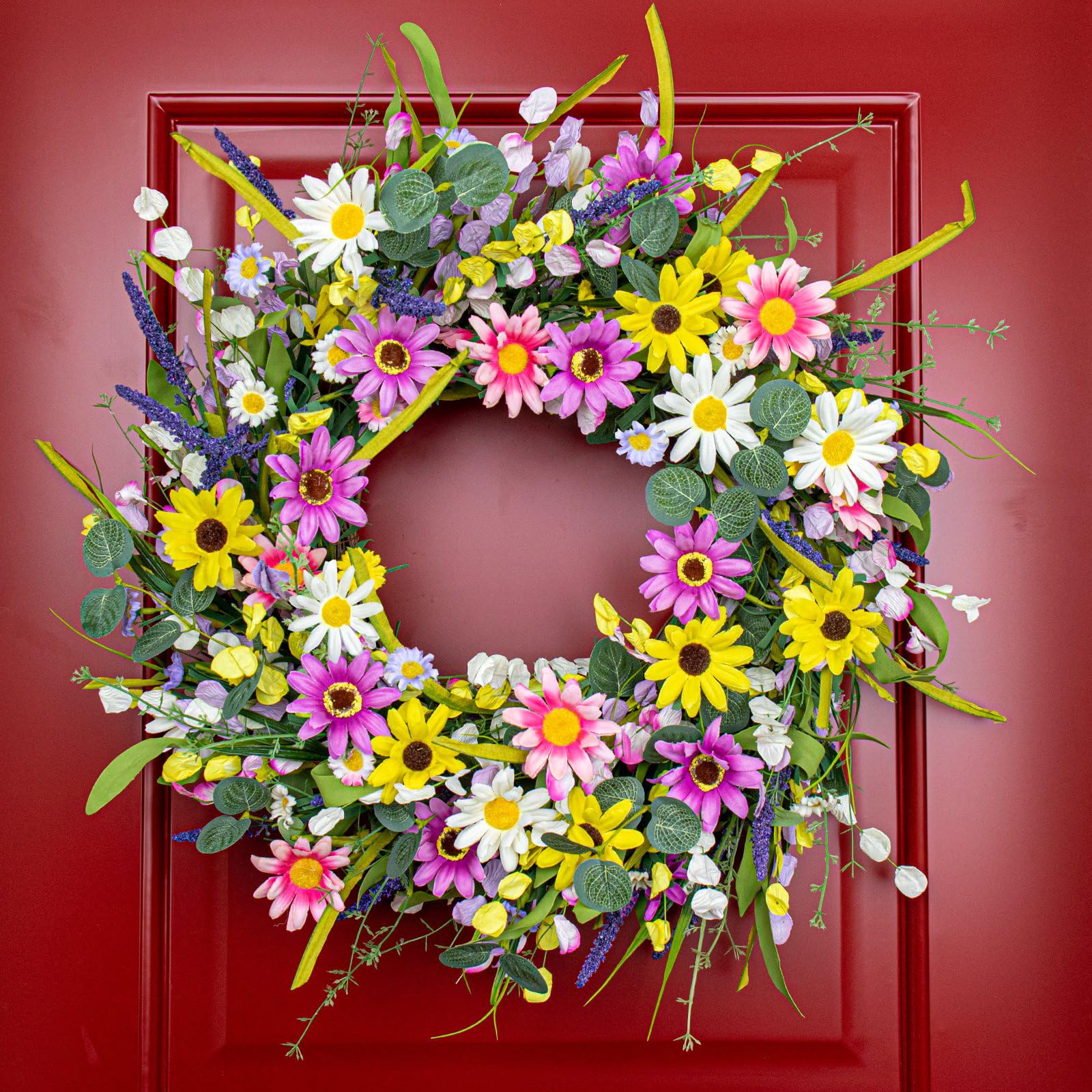 Yawwind spring flower wreath suitable for indoor display or covered outdoor use.