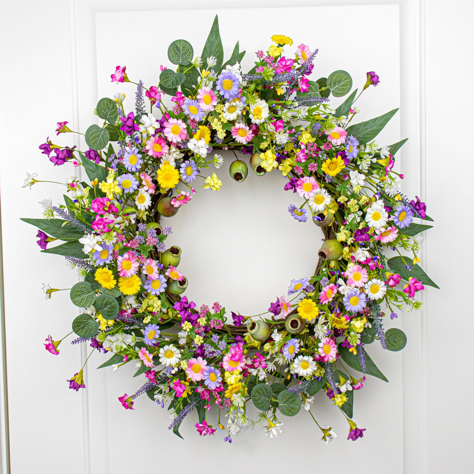 Yawwind wildflower wreath with lavender and daisy brightens entryways for seasonal decor.