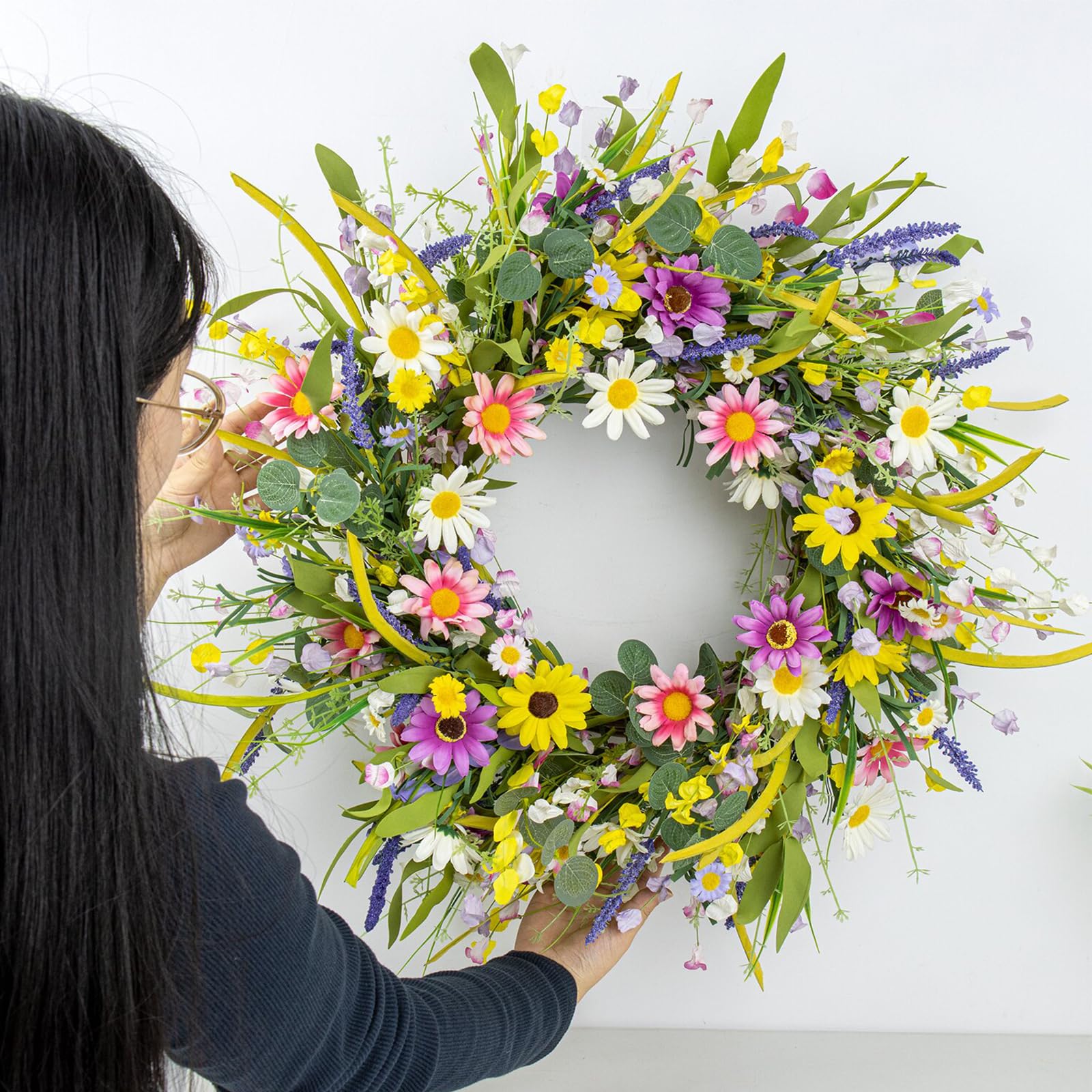 Yawwind wildflower wreath window display complements interiors with natural charm.