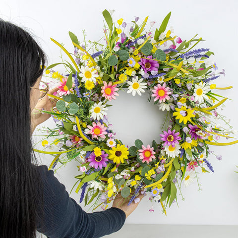 Yawwind wildflower wreath window display complements interiors with natural charm.