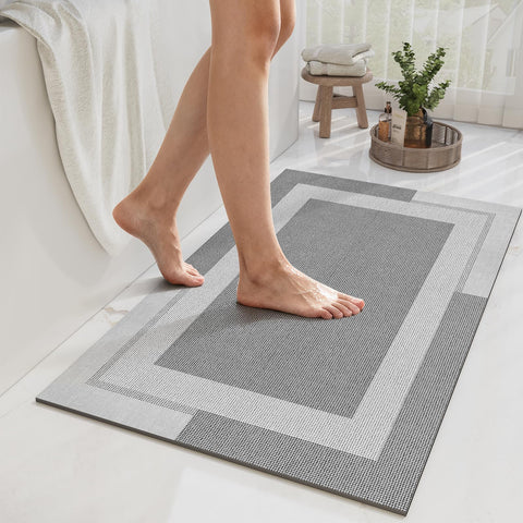 YDKGL non-slip bath mat with rubber backing prevents slipping on wet floors.