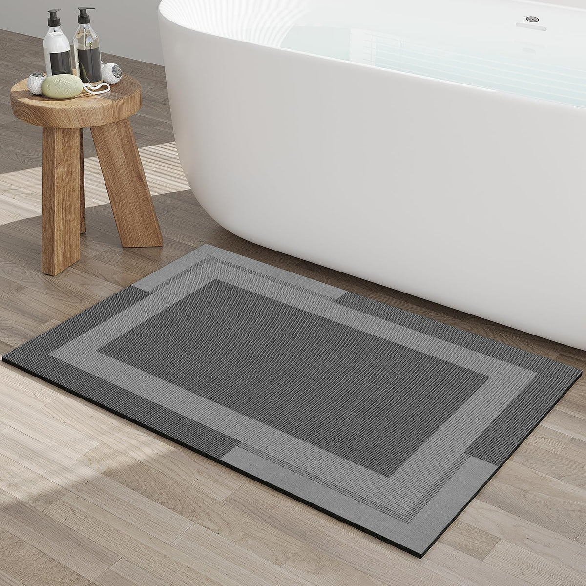 YDKGL non-slip bath mat with rubber backing provides secure grip on wet floors.