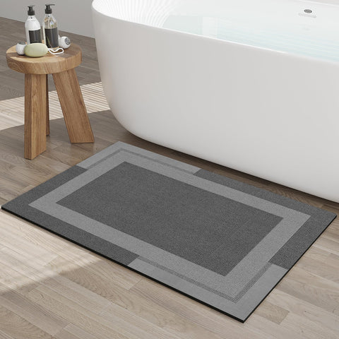YDKGL non-slip bath mat with rubber backing provides secure grip on wet floors.