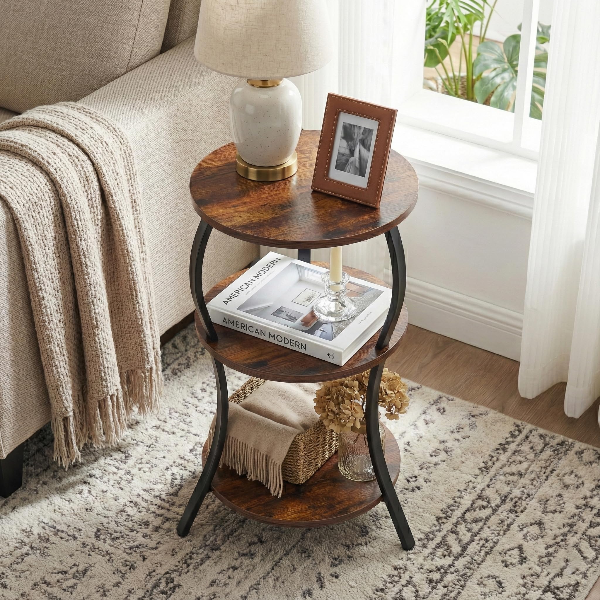YEAKOO Three-tier storage table organizing books and decor.